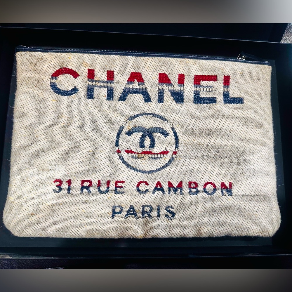 Authentic CHANEL fabric clutch with Black Quilted Interior